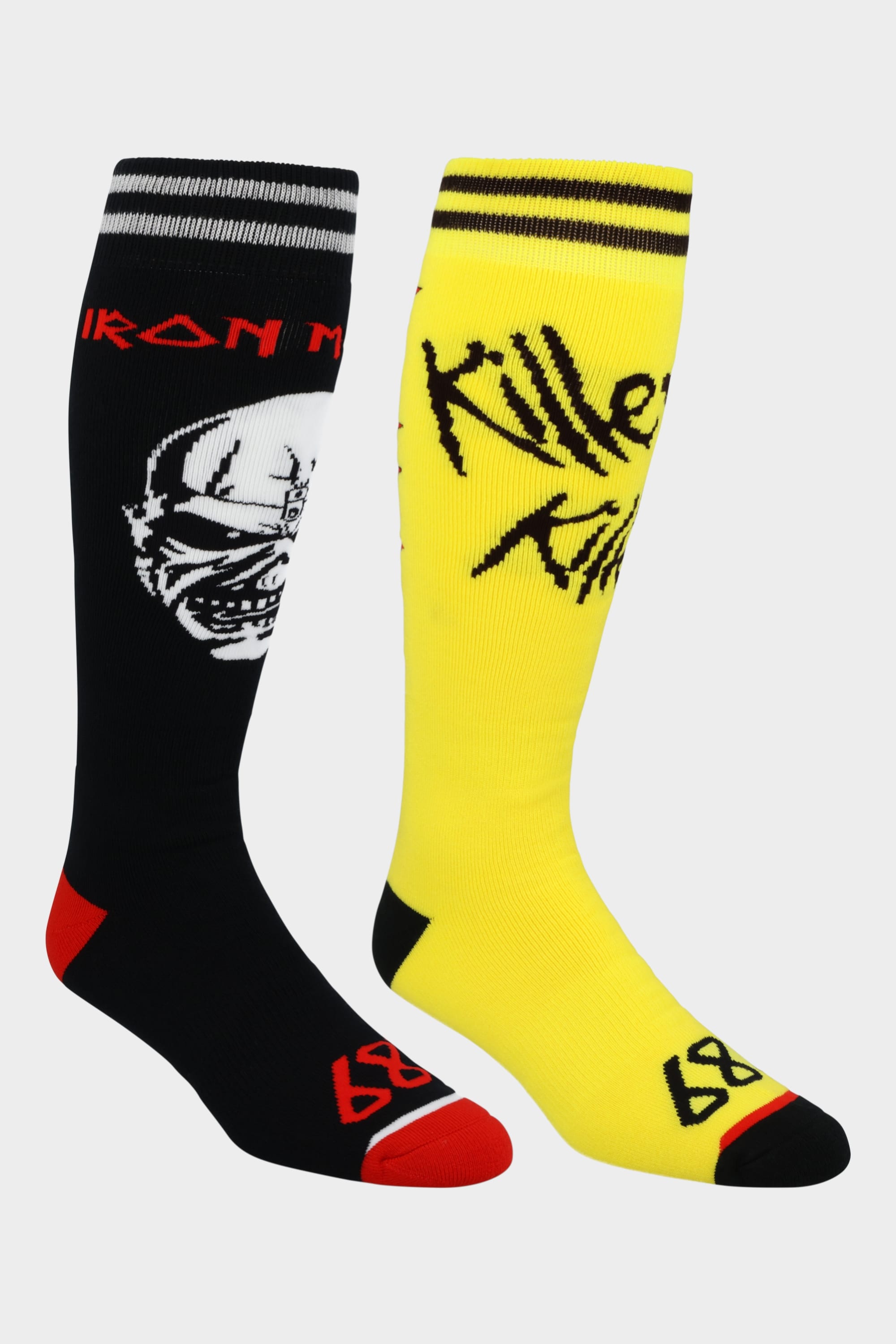 The 686 x Iron Maiden Sock 2-Pack by 686 includes one black knee-high sock with red accents, Iron Maiden text, and a white skull graphic, plus one yellow sock with black accents and Killer text—ideal for riding or relaxing.