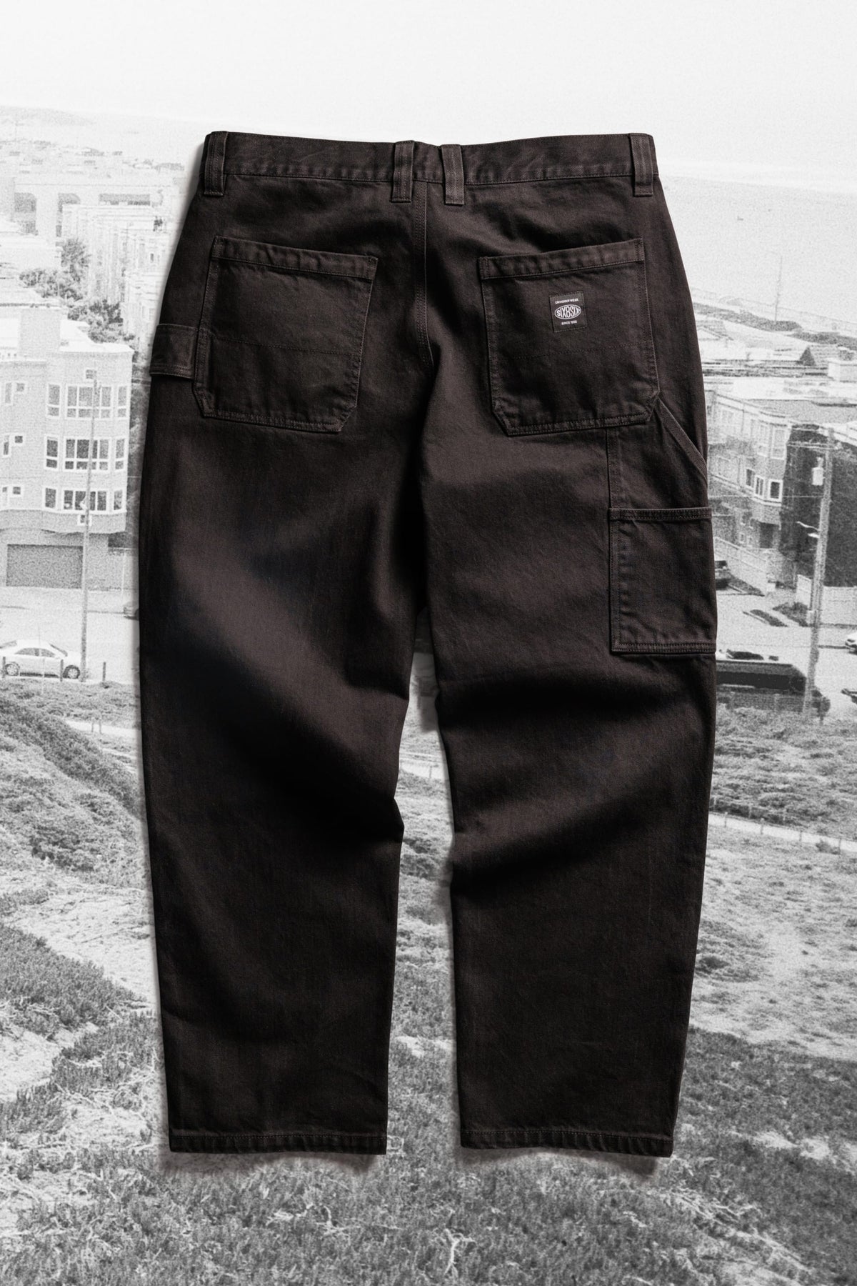 Back view of black 686 Men’s Unwork® Hammerhead Denim Pant featuring two rear patch pockets and a side utility loop.