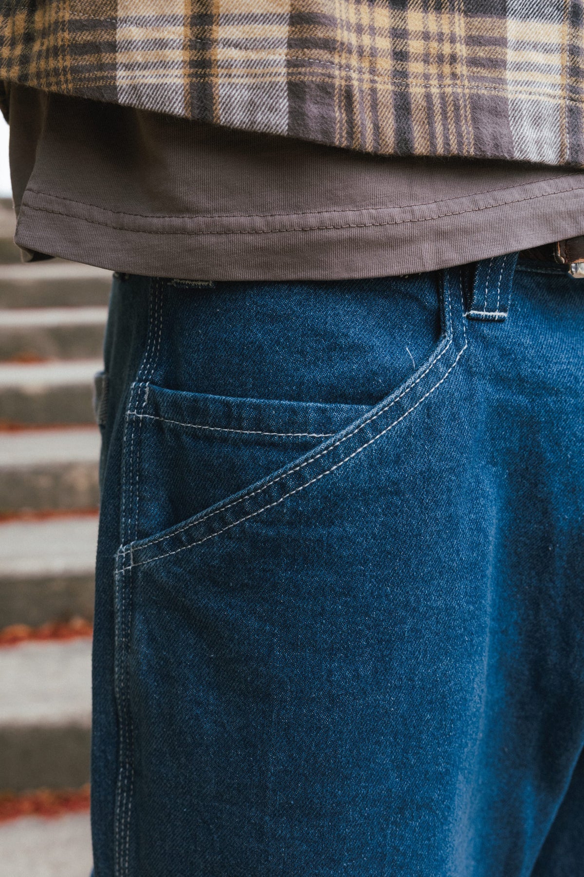 Close-up of 686 Men’s Unwork® Hammerhead Denim Pant heavy-weight cotton jeans featuring deep, slanted pockets with light-colored topstitching.