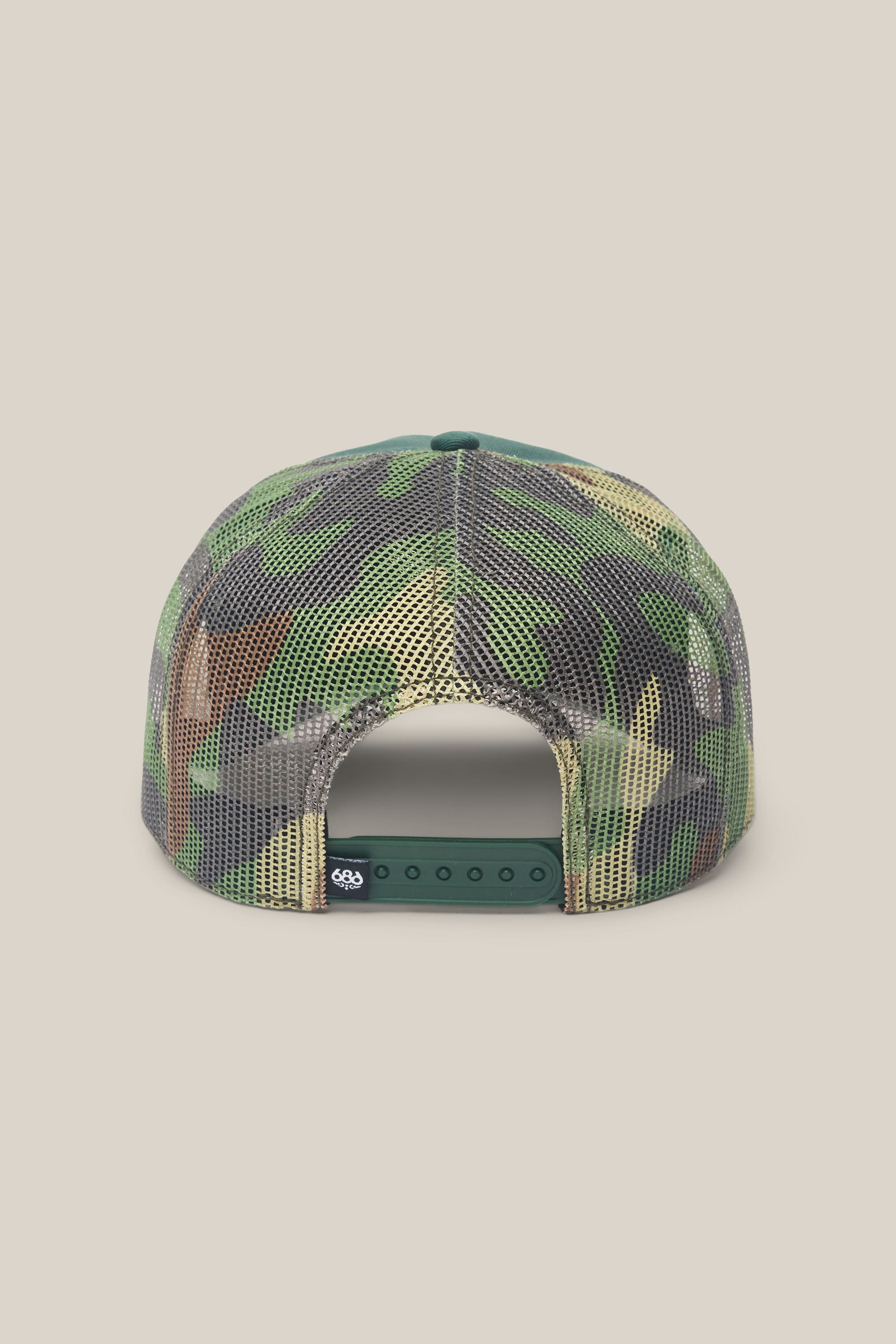 The 686 Mid-Pro Wreath Unstructured 5 Panel Mesh Hat by 686 is shown from the back, featuring a camouflage design with breathable mesh panels and an adjustable green snapback closure. Crafted for both comfort and style, this men's hat is made from durable polyester-cotton materials, offering a modern twist on the classic trucker cap.