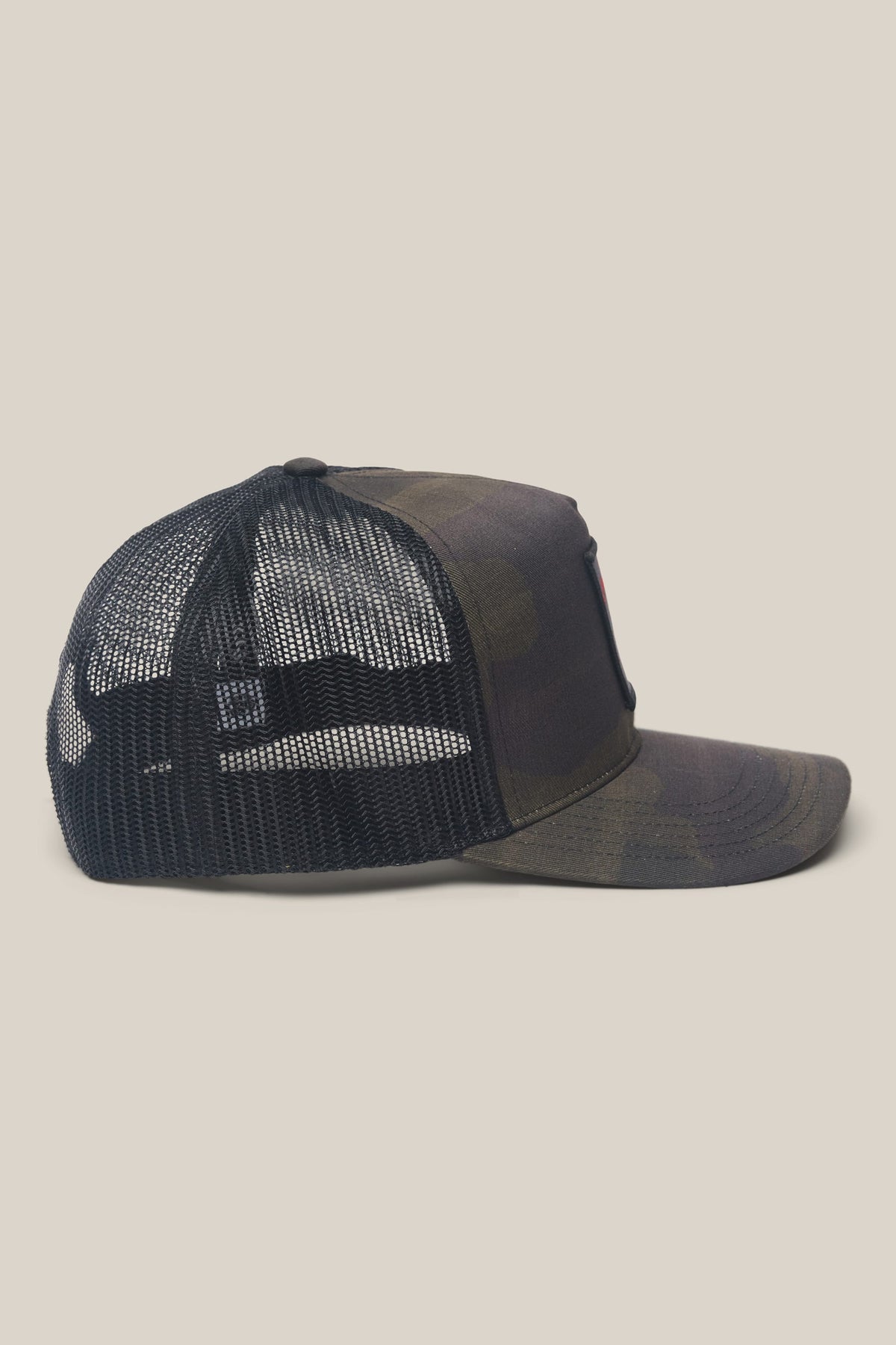 Side view of a 686 Mid Pro Metallica Unstructured Hat in camouflage with a black mesh back.