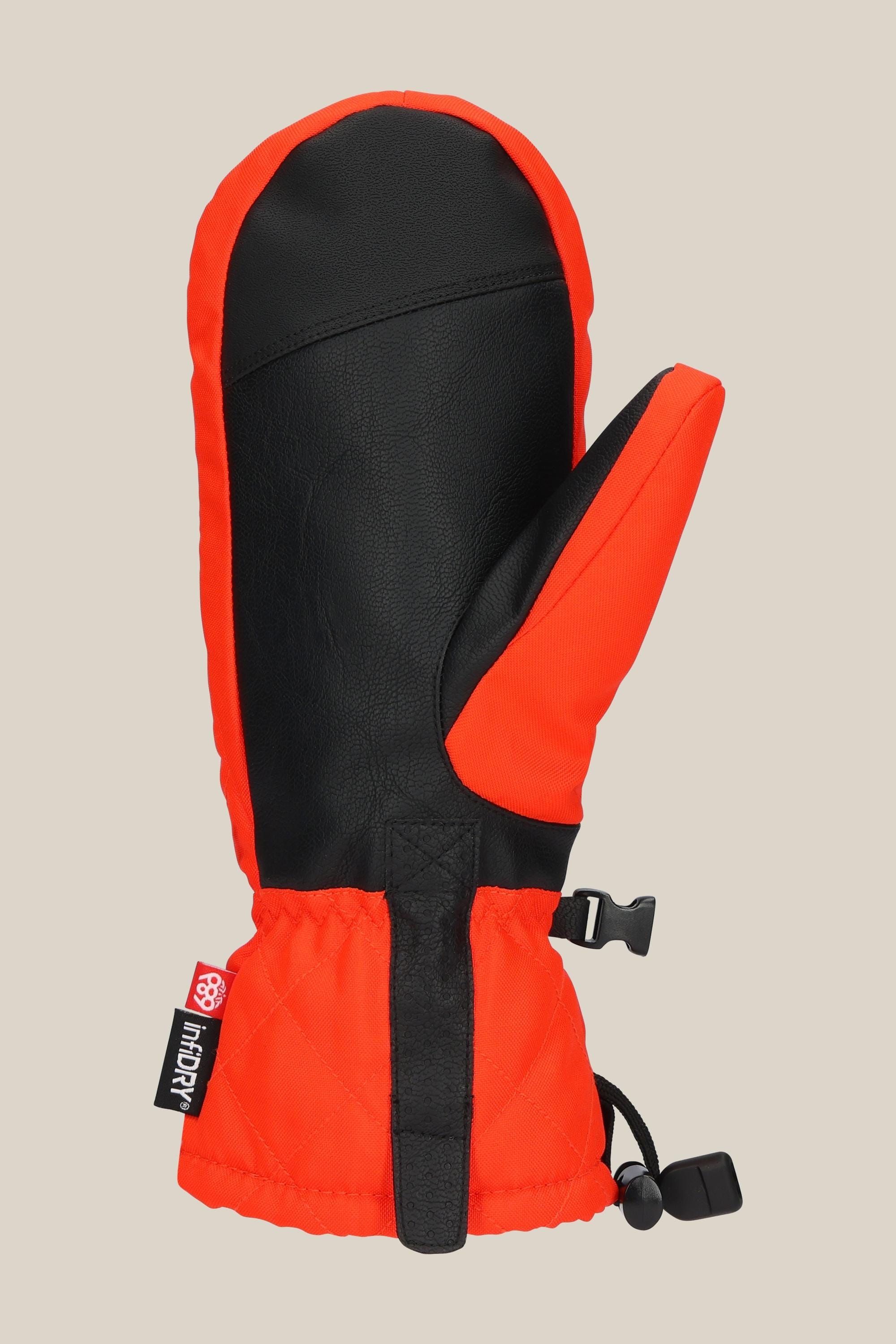 The 686 Womens Jubilee Mitt by 686 is shown in red and black with light insulation, a cinched wrist, black palm, adjustable strap, and is waterproof. Displayed against a light beige background.