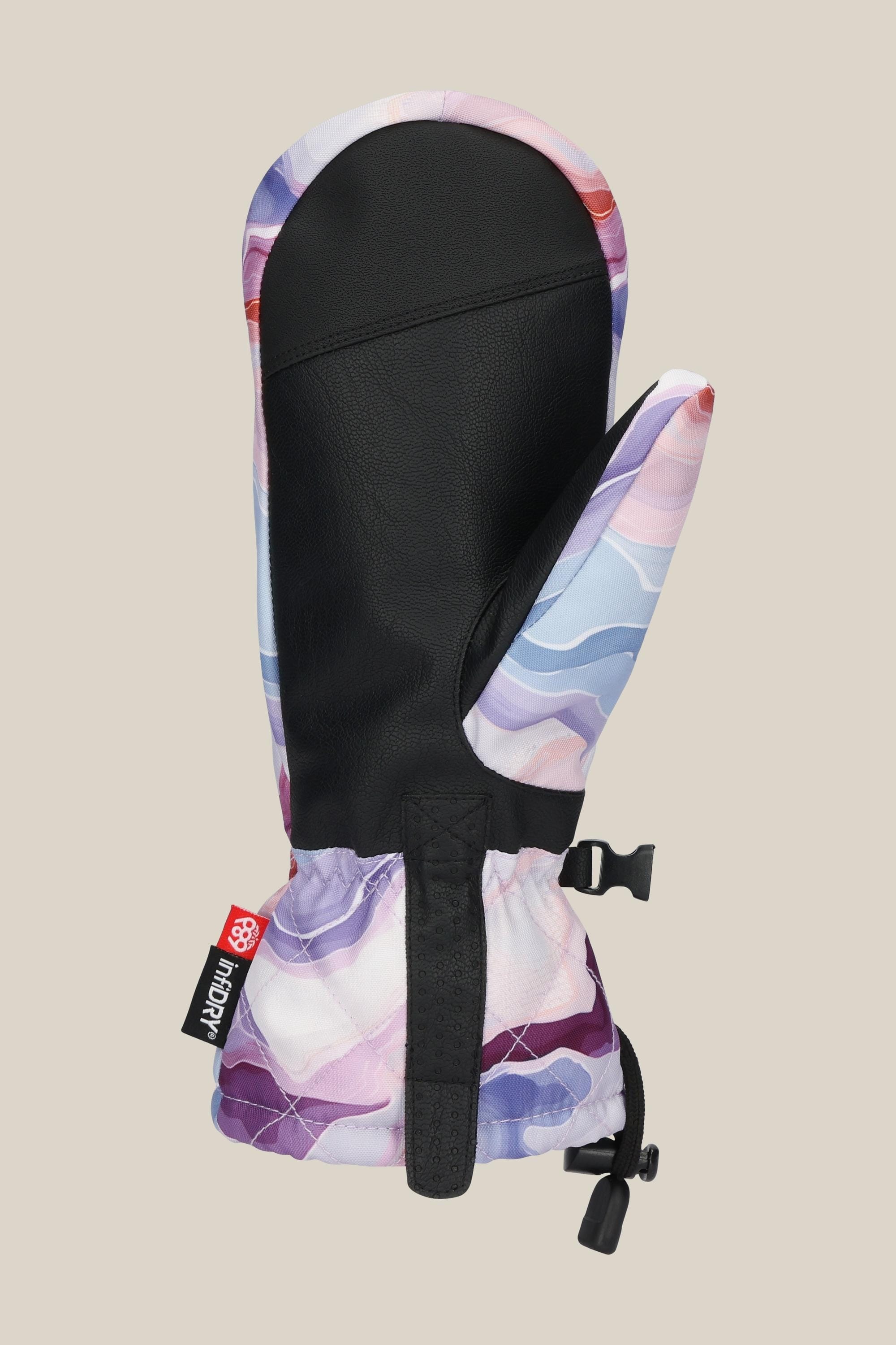 The 686 Womens Jubilee Mitt by 686 is a mitten-style winter glove with a black leather palm, multicolored pastel fabric, light insulation, waterproof design, wrist cinch, adjustable strap, Soundtouch tech, and a small red and black NDMT tag.
