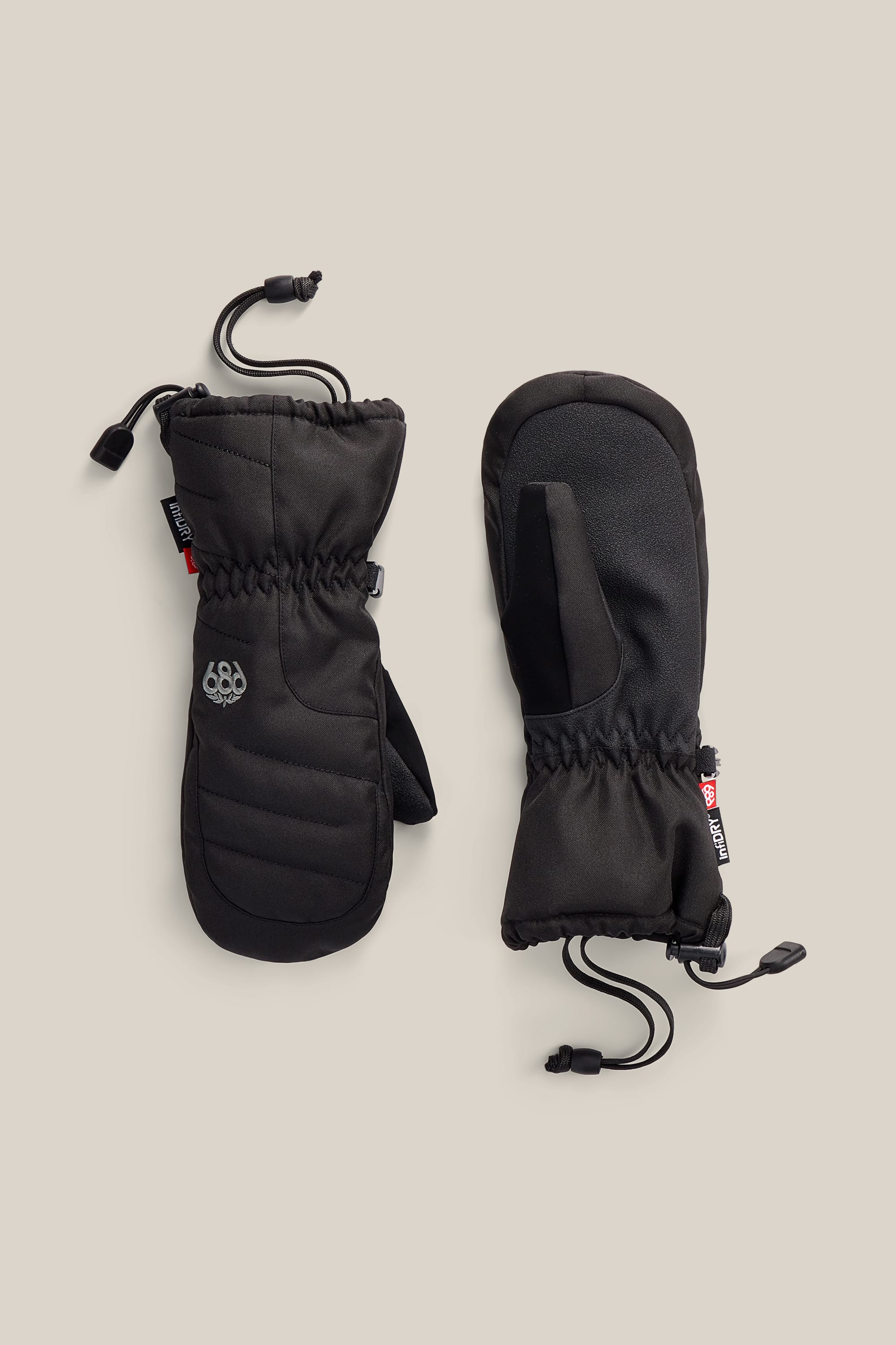 A pair of 686 Youth Heat Insulated Mitts in black, featuring adjustable wrist cords and a small 686 logo, displayed on a neutral background.