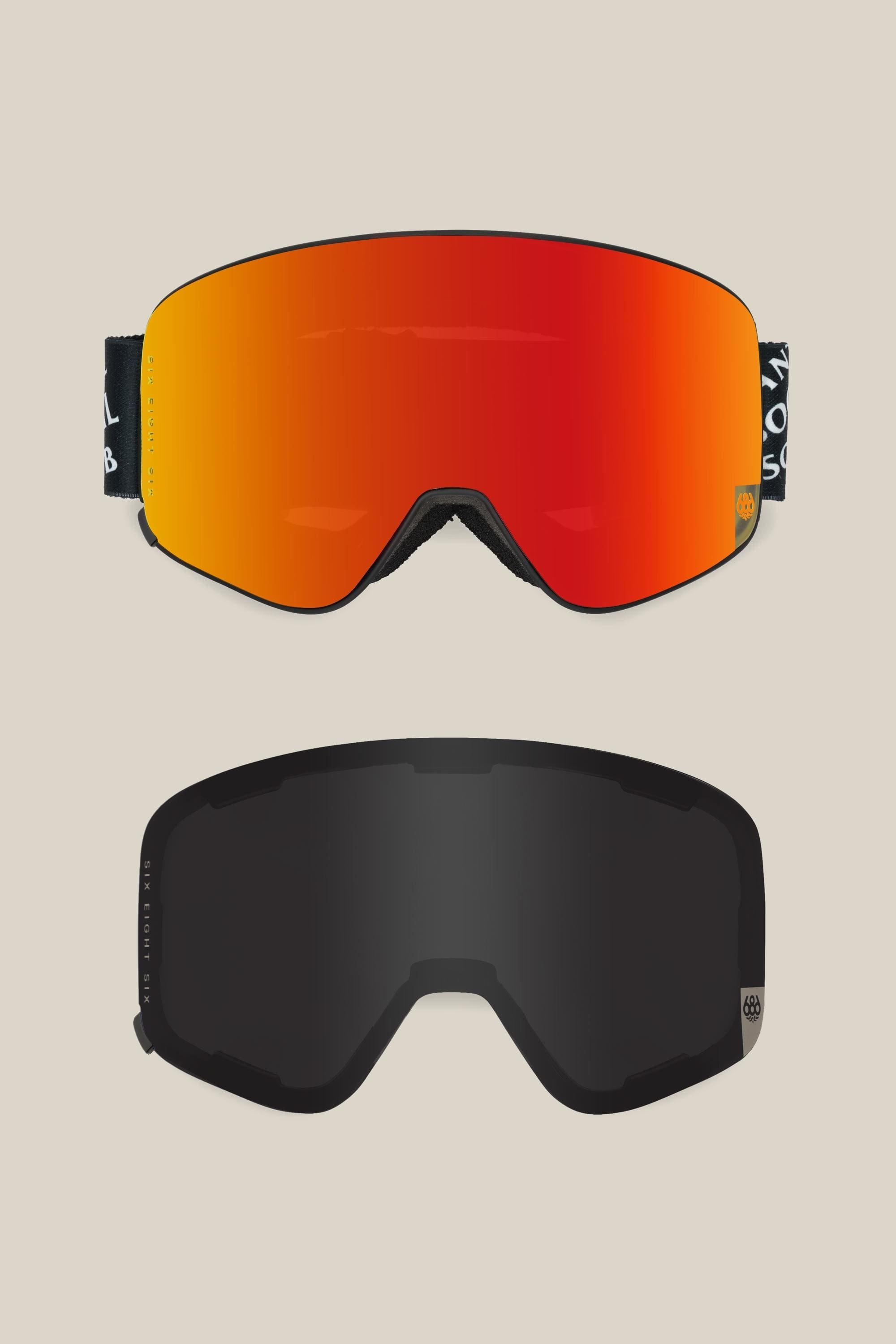 Two 686 SMARTY® Magnetic Goggle lenses are displayed separately: the top is reflective red-orange, and the bottom is dark-tinted black. Both have a rounded rectangular shape with black trim. Brand: 686.