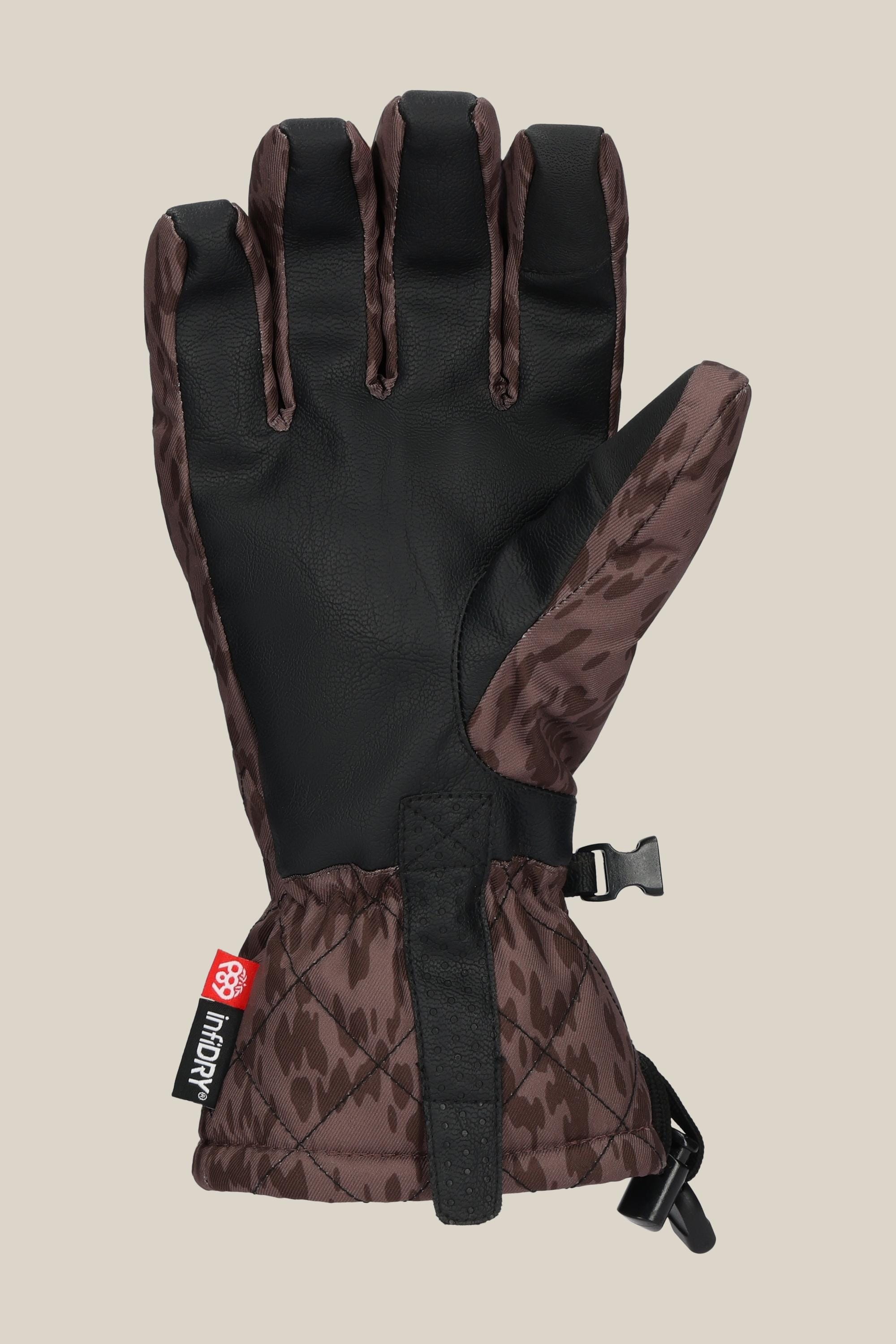 The 686 Womens Jubilee Glove by 686 features brown and black insulated design, patterned fabric back, black PU palm, adjustable wrist strap, clip, and a red-and-white HINOPY tag on the cuff.