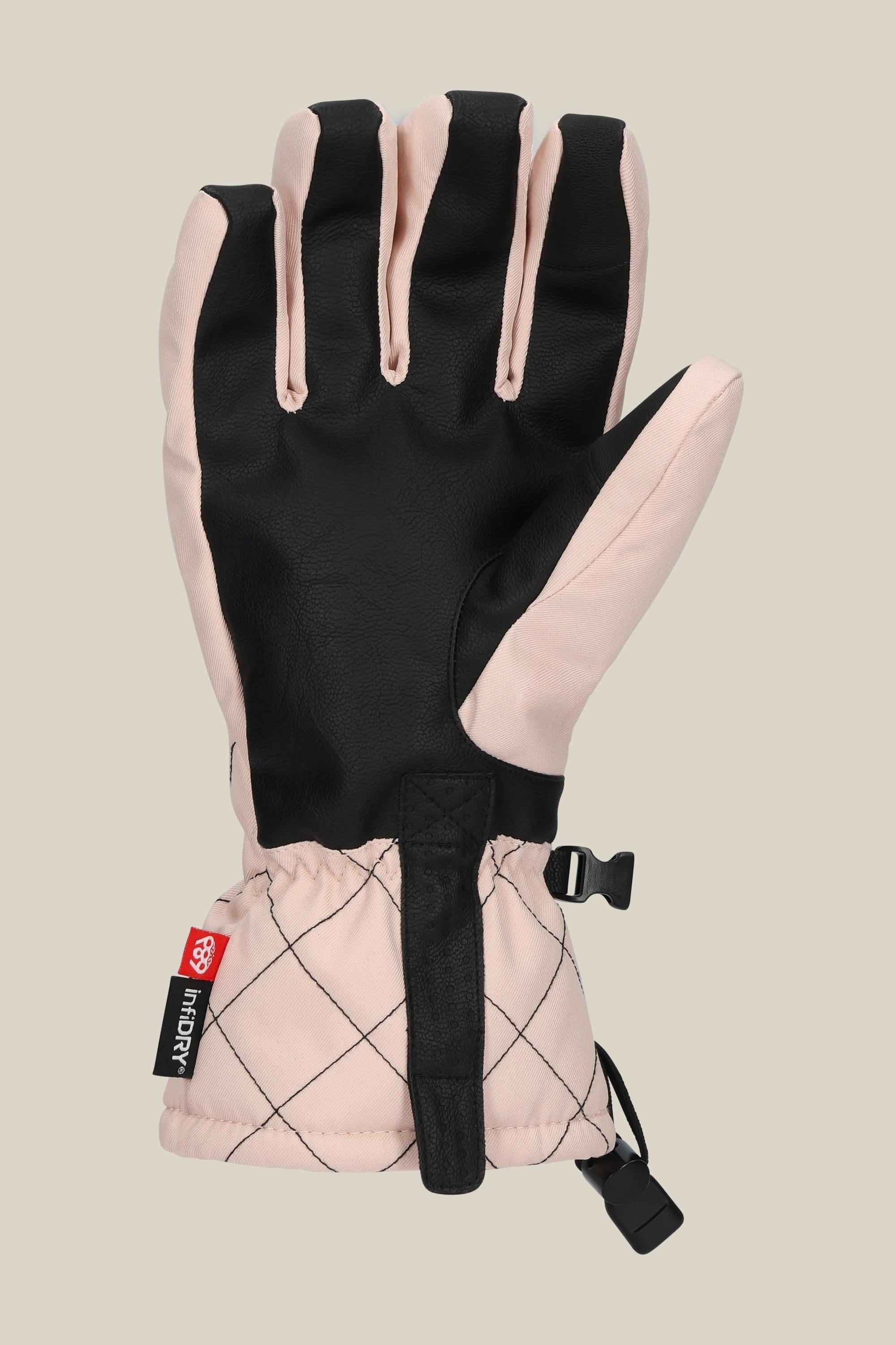 The 686 Womens Jubilee Glove by 686 is a pink and black PU glove featuring a quilted wrist, black palm and thumb, adjustable wrist strap, and a red-and-black brand tag. The glove is shown palm up on a neutral background.