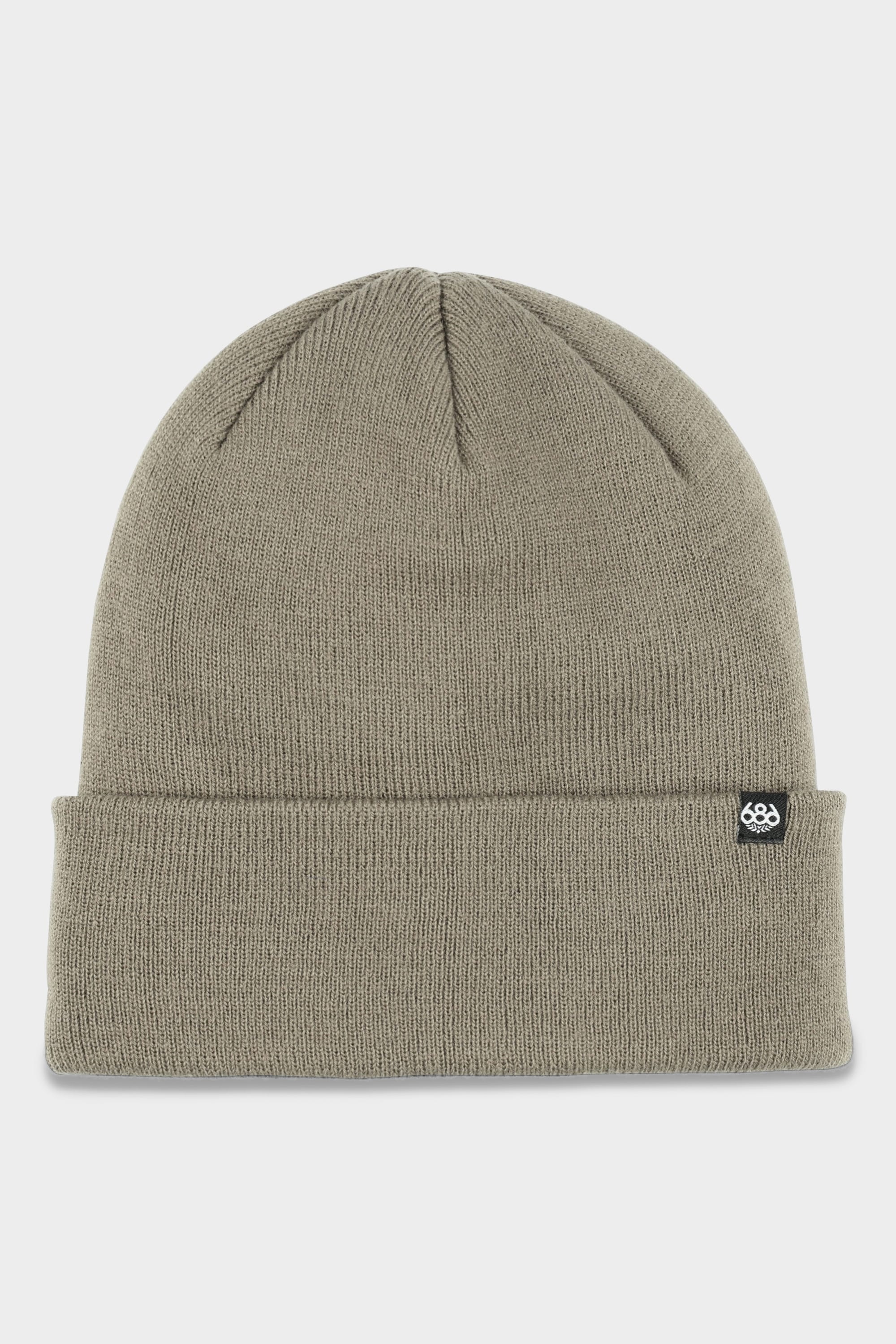 The 686 Standard Roll Up Beanie by 686 is a plain, light olive-green knit hat featuring a folded brim and a small black logo tag on the cuff, displayed on a white background.