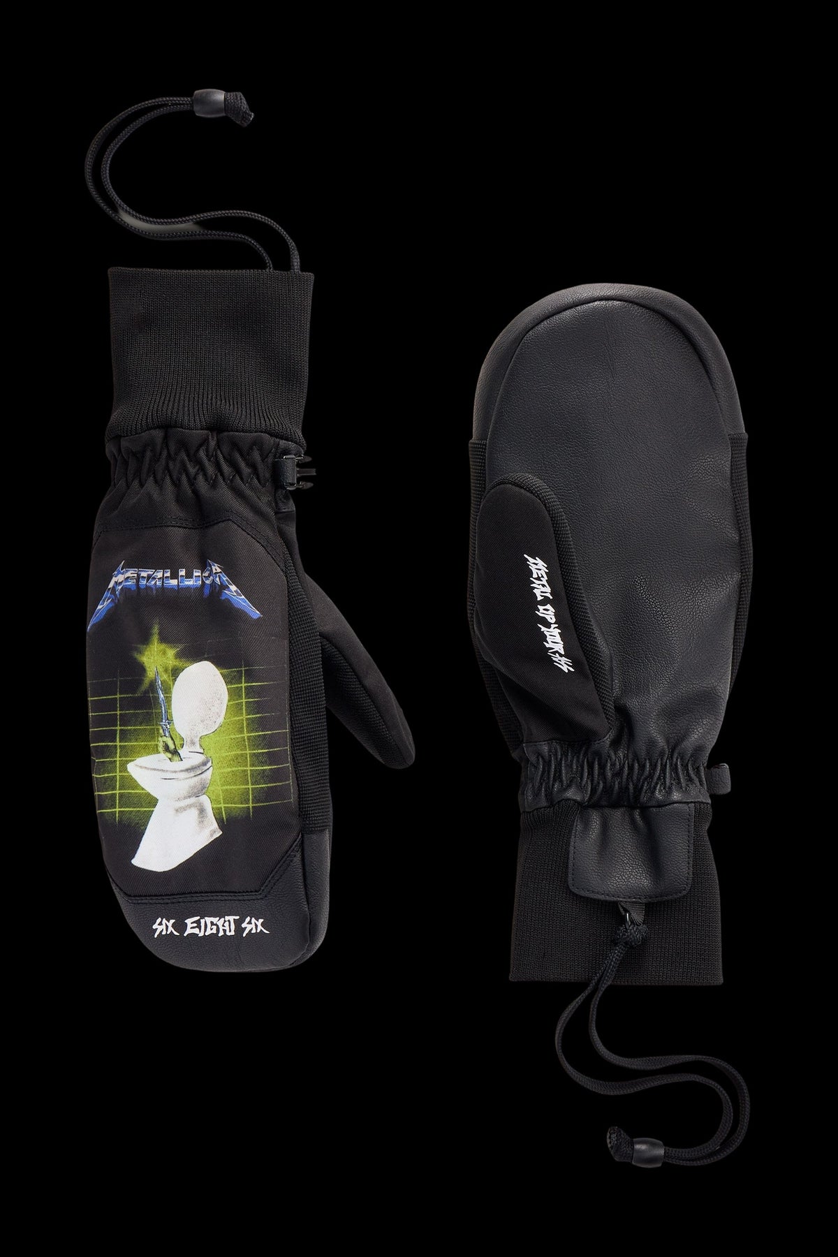 Pair of black 686 Men’s Crush Insulated Mitt winter mittens featuring a graphic of a toilet and a sword on the back of one and text on the palm side.