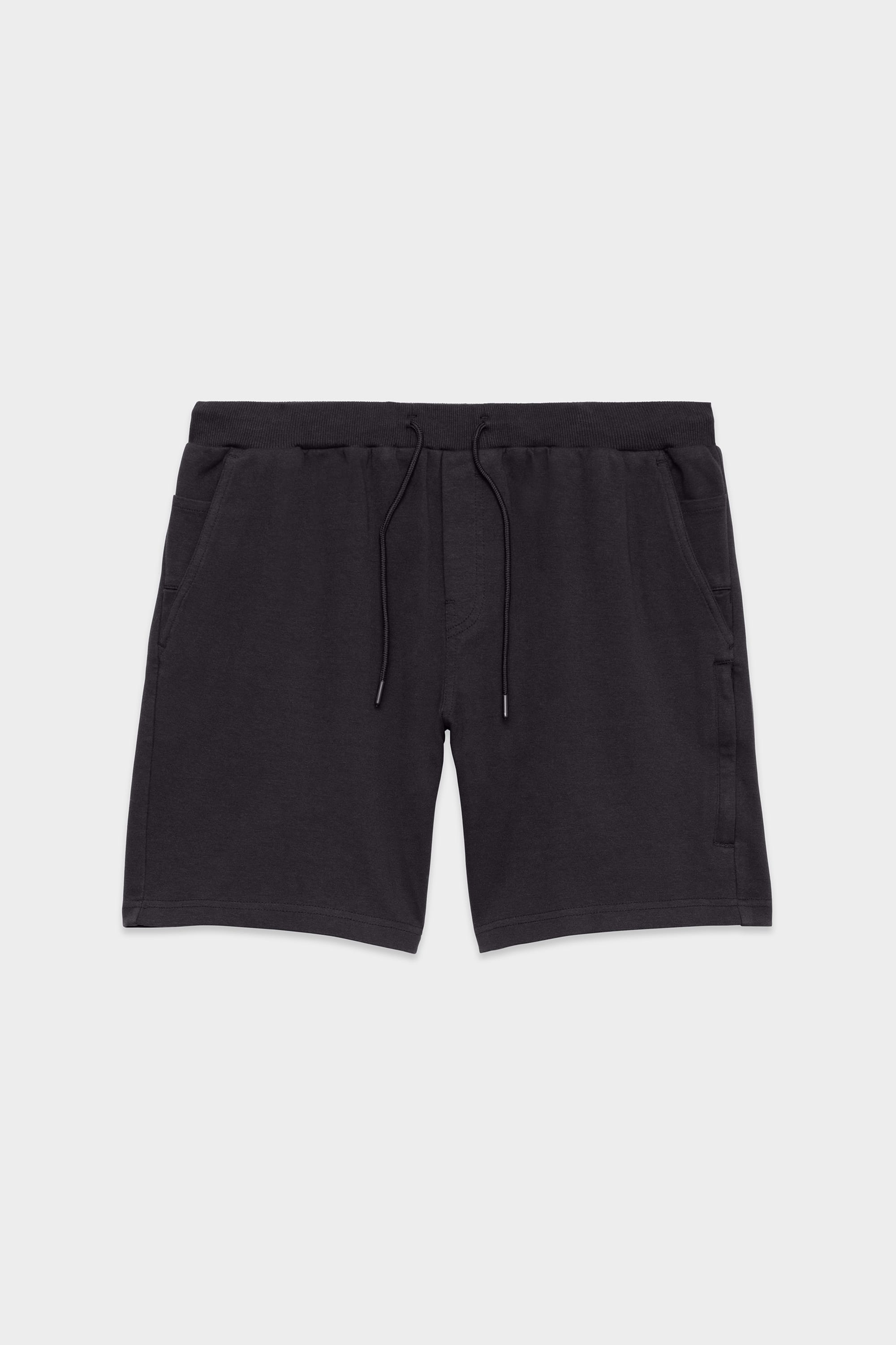 The 686 Mens Everywhere Double Knit Short by 686, featuring an elastic waistband, drawstring ties, and side pockets, is shown laid flat on a light gray background.