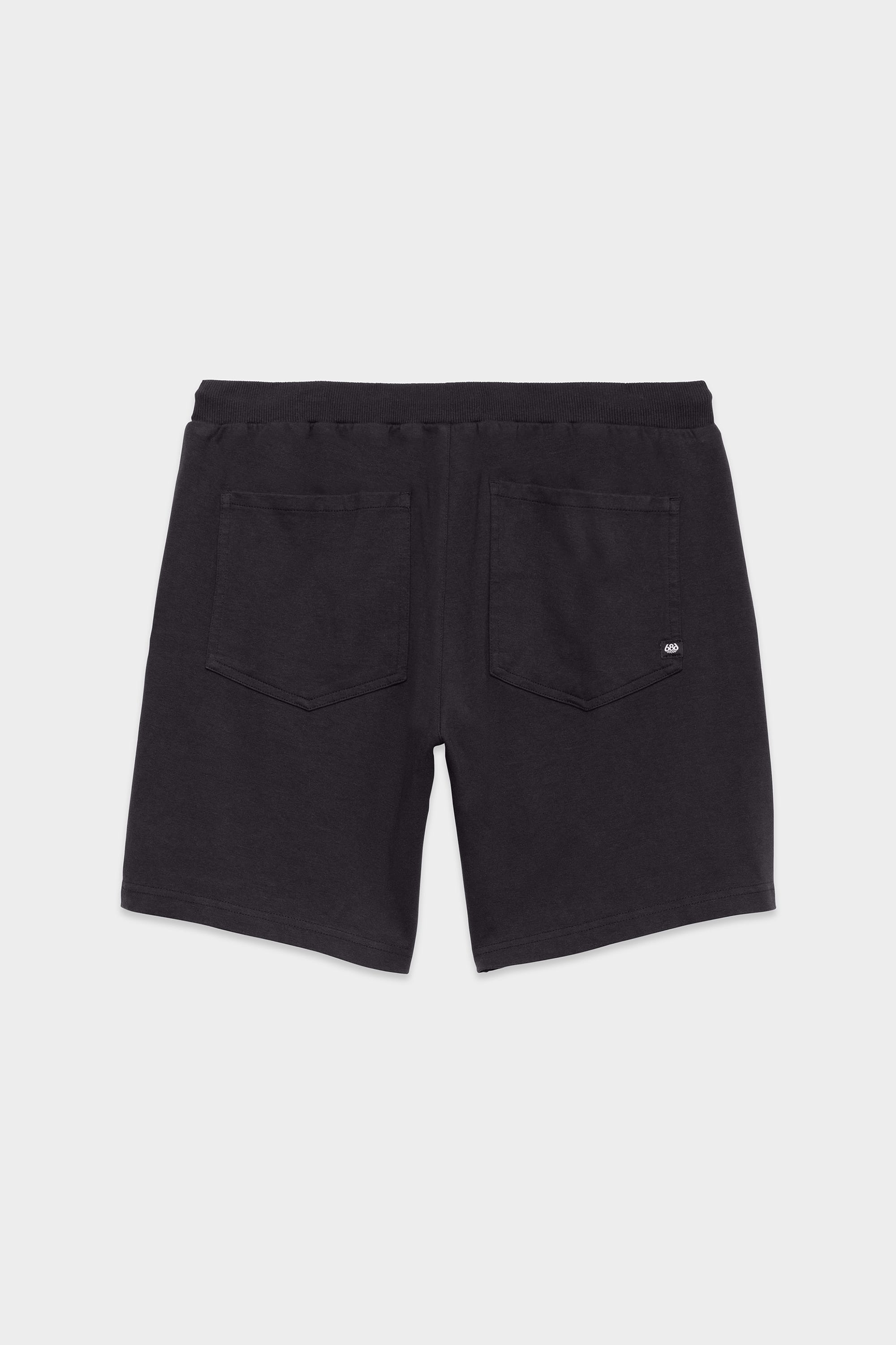 The 686 Mens Everywhere Double Knit Short by 686 is shown from the back, featuring two back pockets and an elastic waistband. The soft fabric offers a comfortable fit, perfect for casual wear.